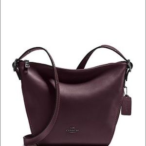 Coach small dufflette in natural leather- ox blood